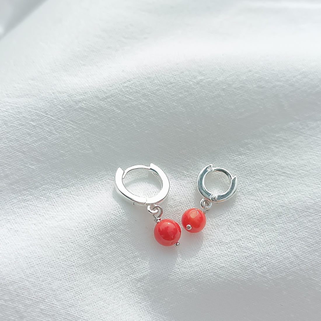 Orecchini cerchio argento e corallo