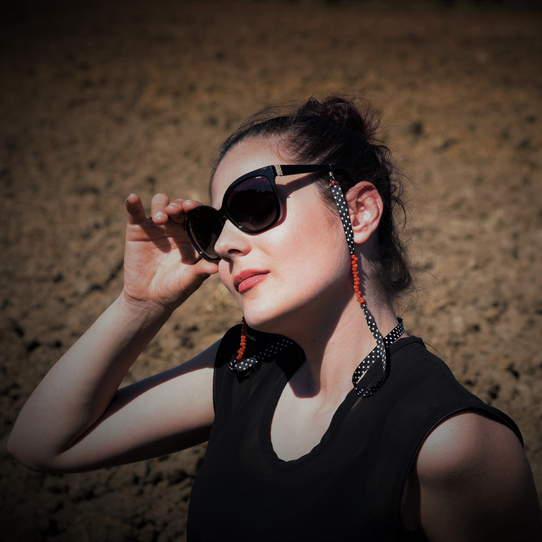 Catenella occhiali a pois e corallo