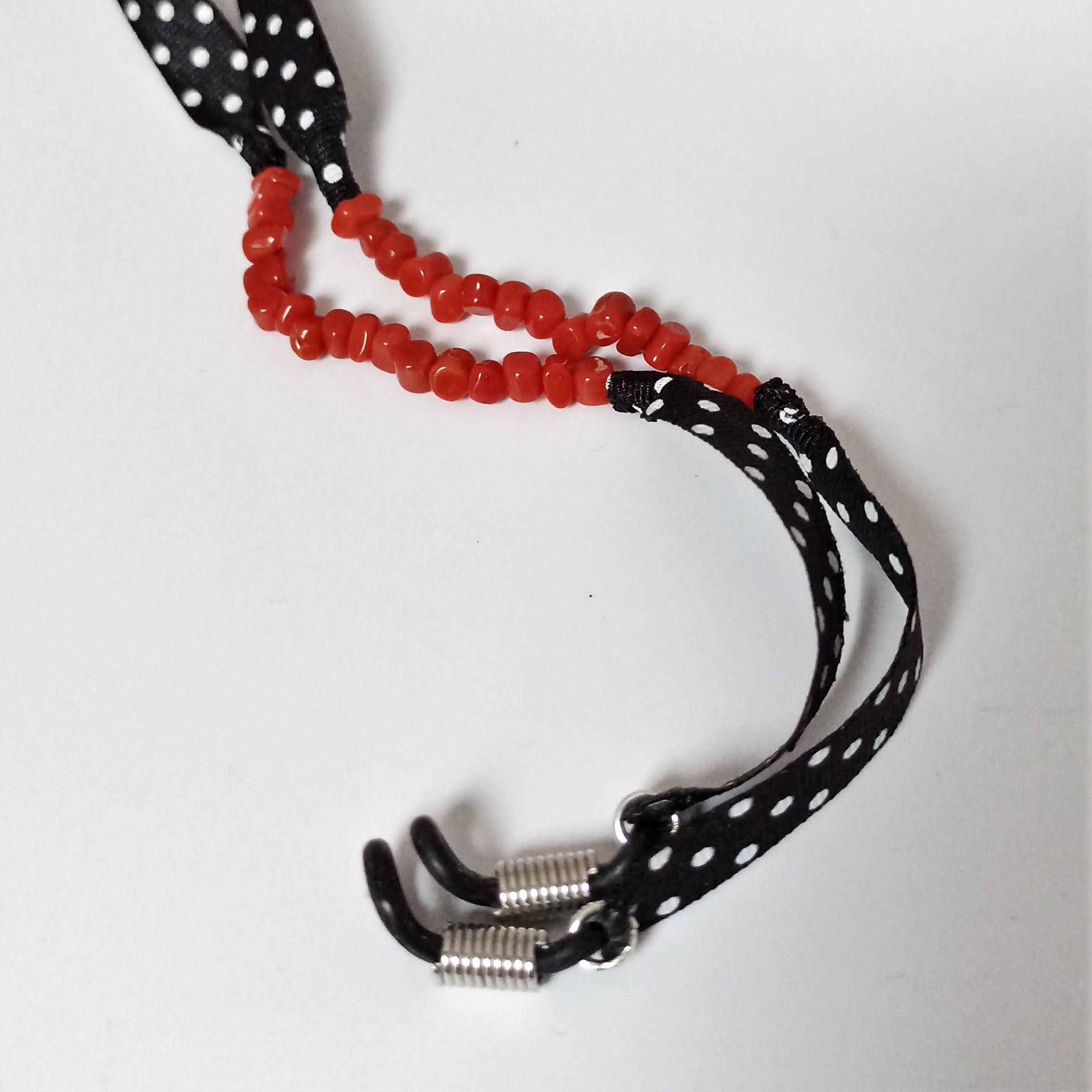 Catenella occhiali a pois e corallo