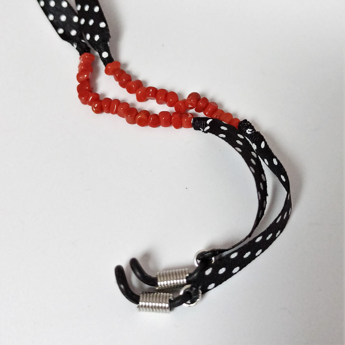 Catenella occhiali a pois e corallo